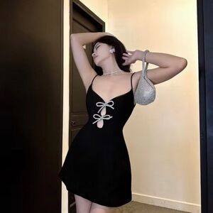 Elegant Black Dress with Bow Details